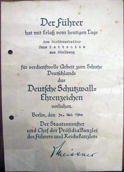 Documento de concesión de la medalla del muro Atlántico.